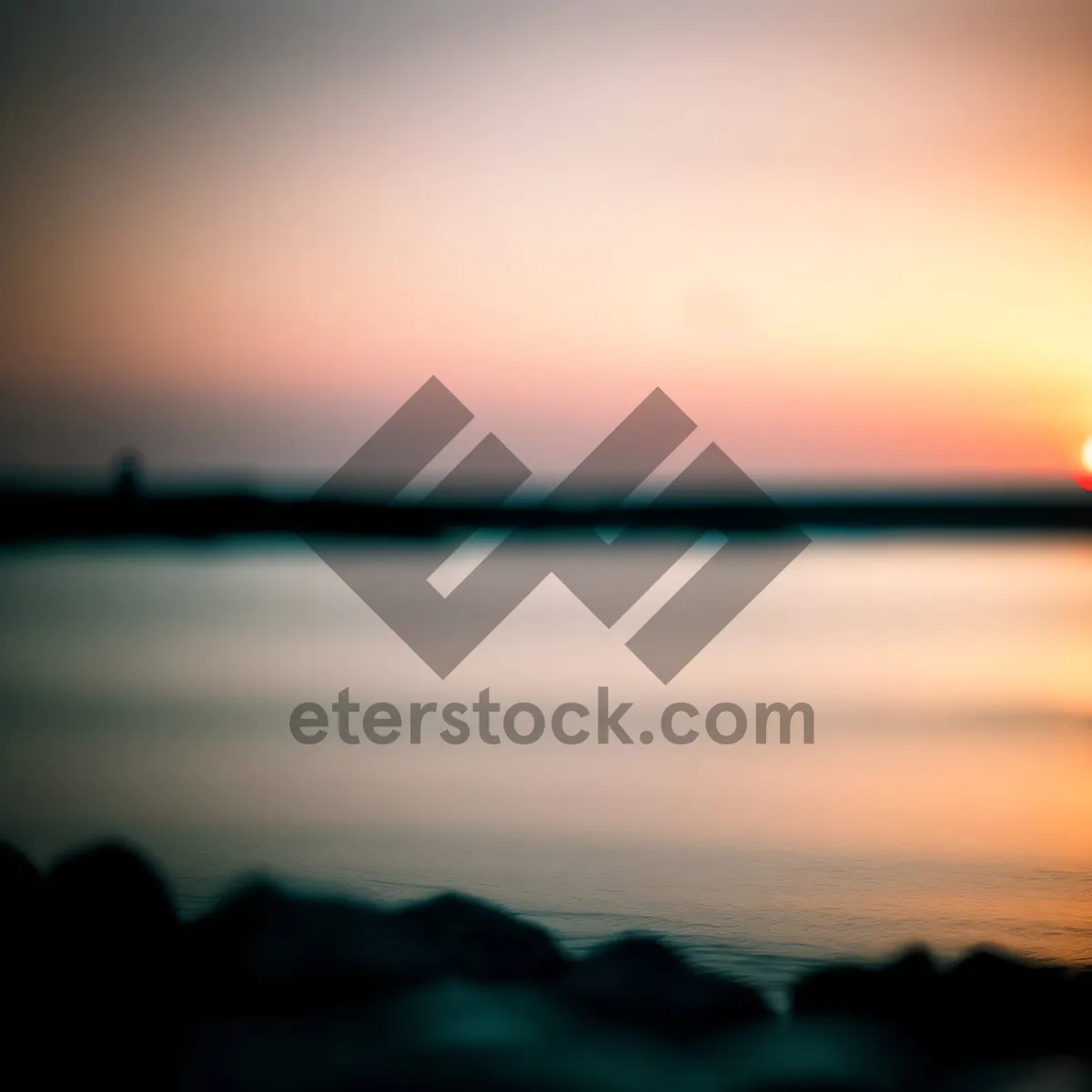 Picture of Golden Skyline: A Serene Sunset over the Ocean