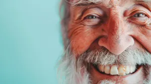 Happy Elderly Man with Mustache and Smiling Eyes