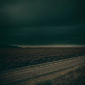 Desert Road Landscape Under Clear Sky