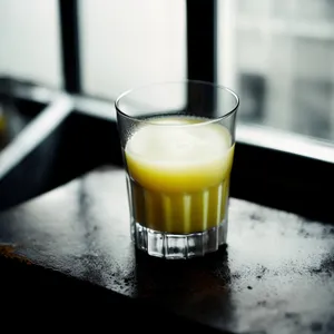 Refreshing Coffee in Yellow Glass Mug