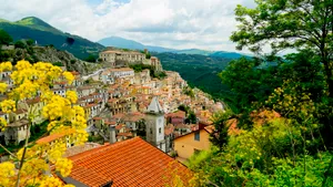 Cityscape with Church and Houses Against Skyline