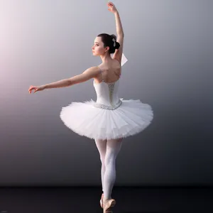 Elegant Ballerina Posing in Studio