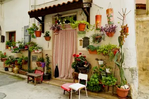 Beautiful Home Exterior with Table and Garden Décor