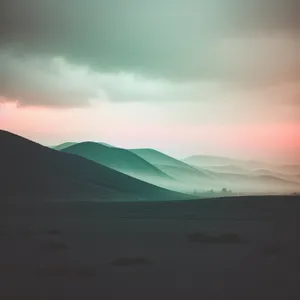 Golden Horizon: Majestic Sunset over Desert Dunes