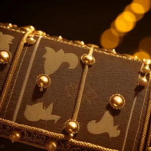 Antique Golden Chest with Ornate Buckle