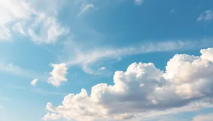 Bright Summer Sky with Fluffy Clouds and Sunshine