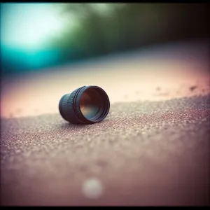 Patterned Light Thimble Cap: Close-up Texture with Container