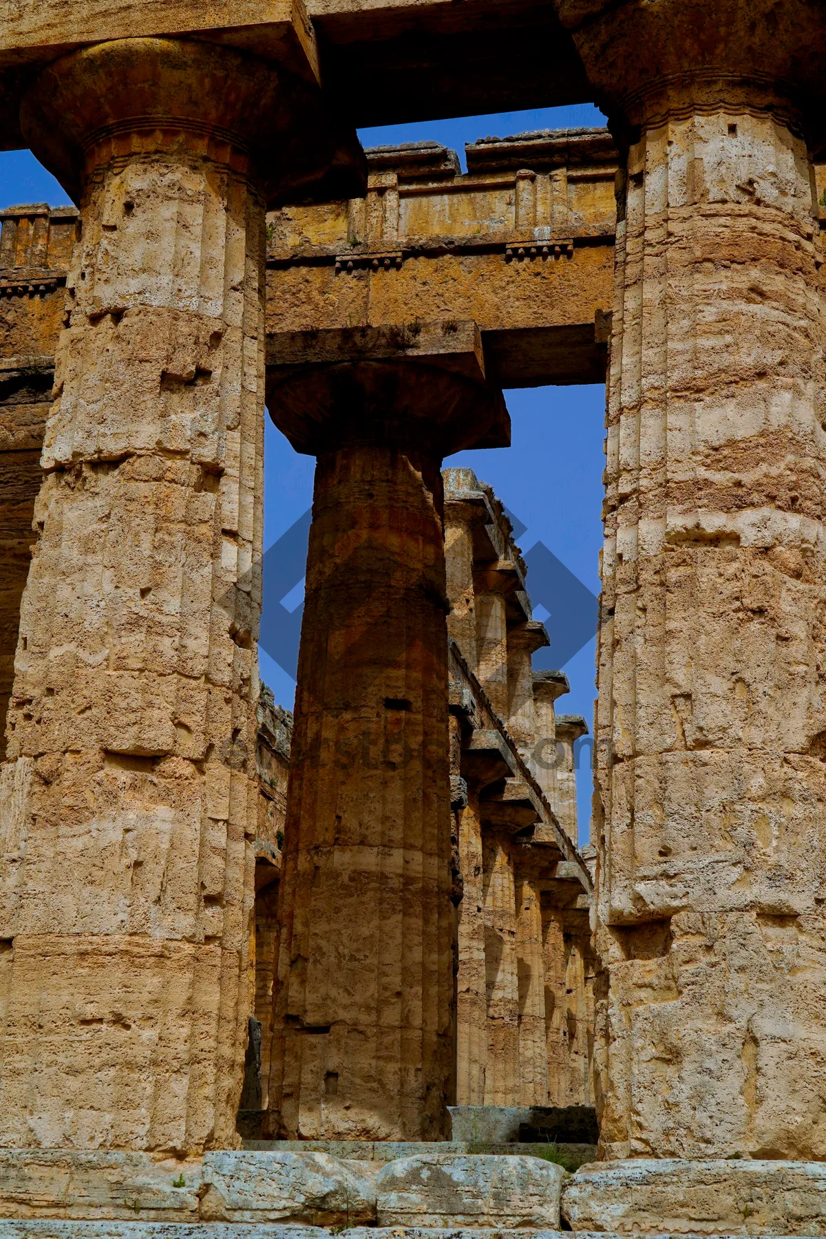 Picture of Ancient Roman temple ruins against a clear blue sky