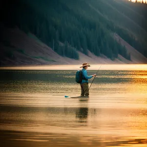 Golden Horizon: Beach Paddleboarding at Sunset