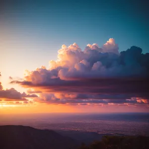 Vibrant Sunset Over Majestic Mountain Landscape