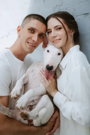 Happy man with cute Borzoi dog.