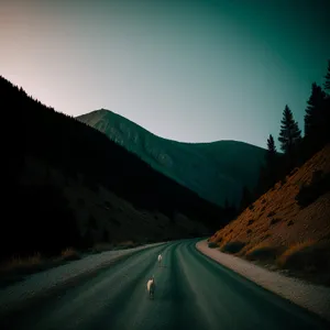 Scenic Mountain Drive on Expressway with Cloudy Horizon