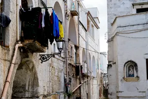 Old city buildings with windows and semaphore signal.