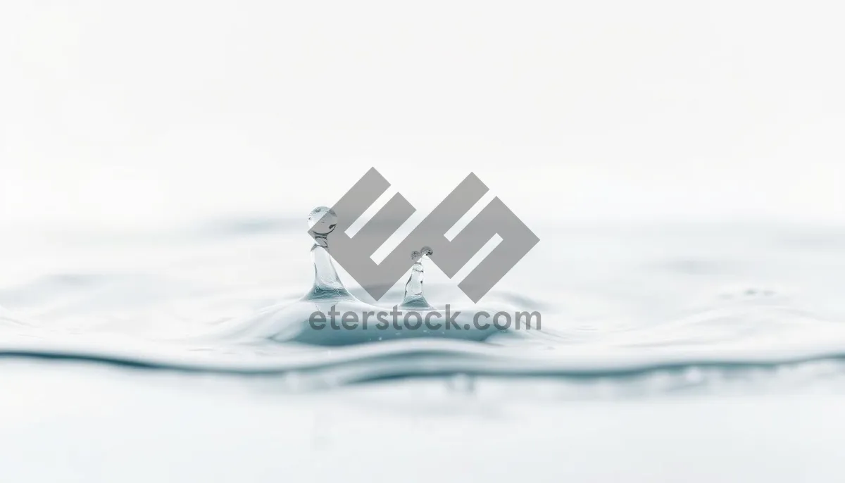 Picture of Refreshing water splash with bubbles and ice cubes.