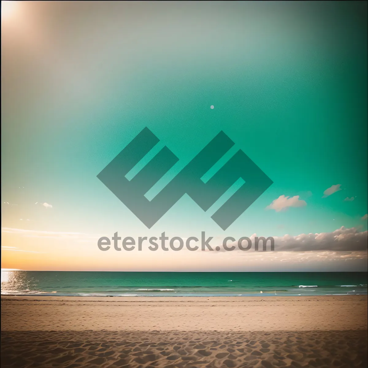 Picture of Sunlit Coastal Oasis: Turquoise Waves on Sandy Beach