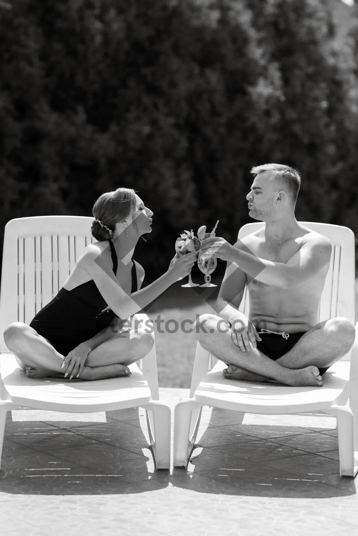 Picture of Happy couple portrait in the park on their wedding day.