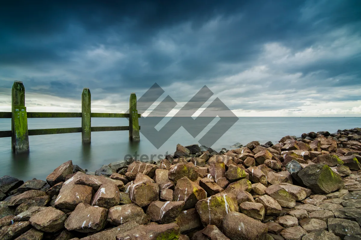 Picture of Coastal Breakwater: Summer Shoreline Structure On Beach.