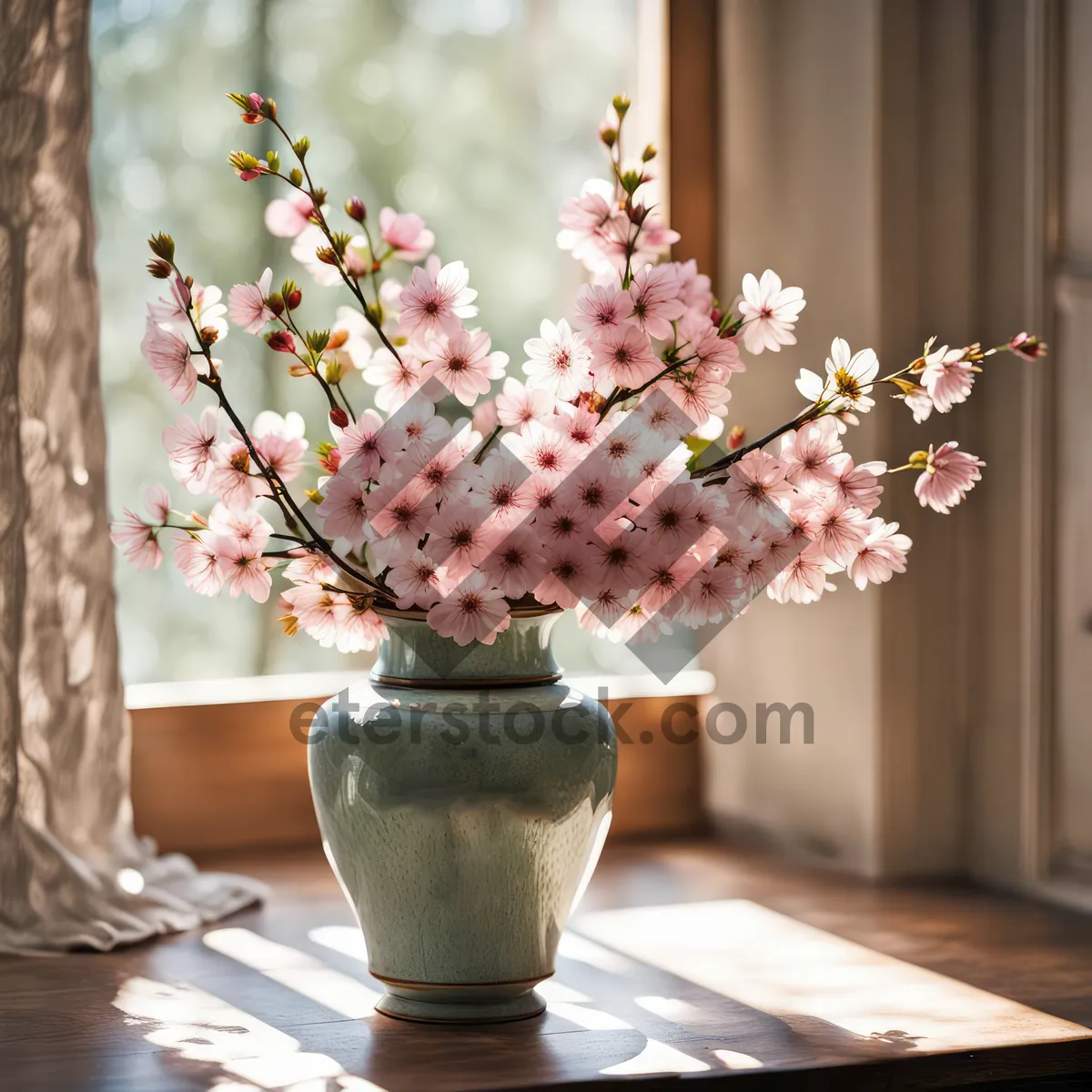 Picture of Pink rose bouquet on glass table centerpiece.