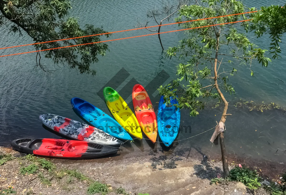 Picture of Tropical coastline with small boat and kayak.