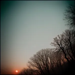 Radiant Sunset Over Serene Landscape