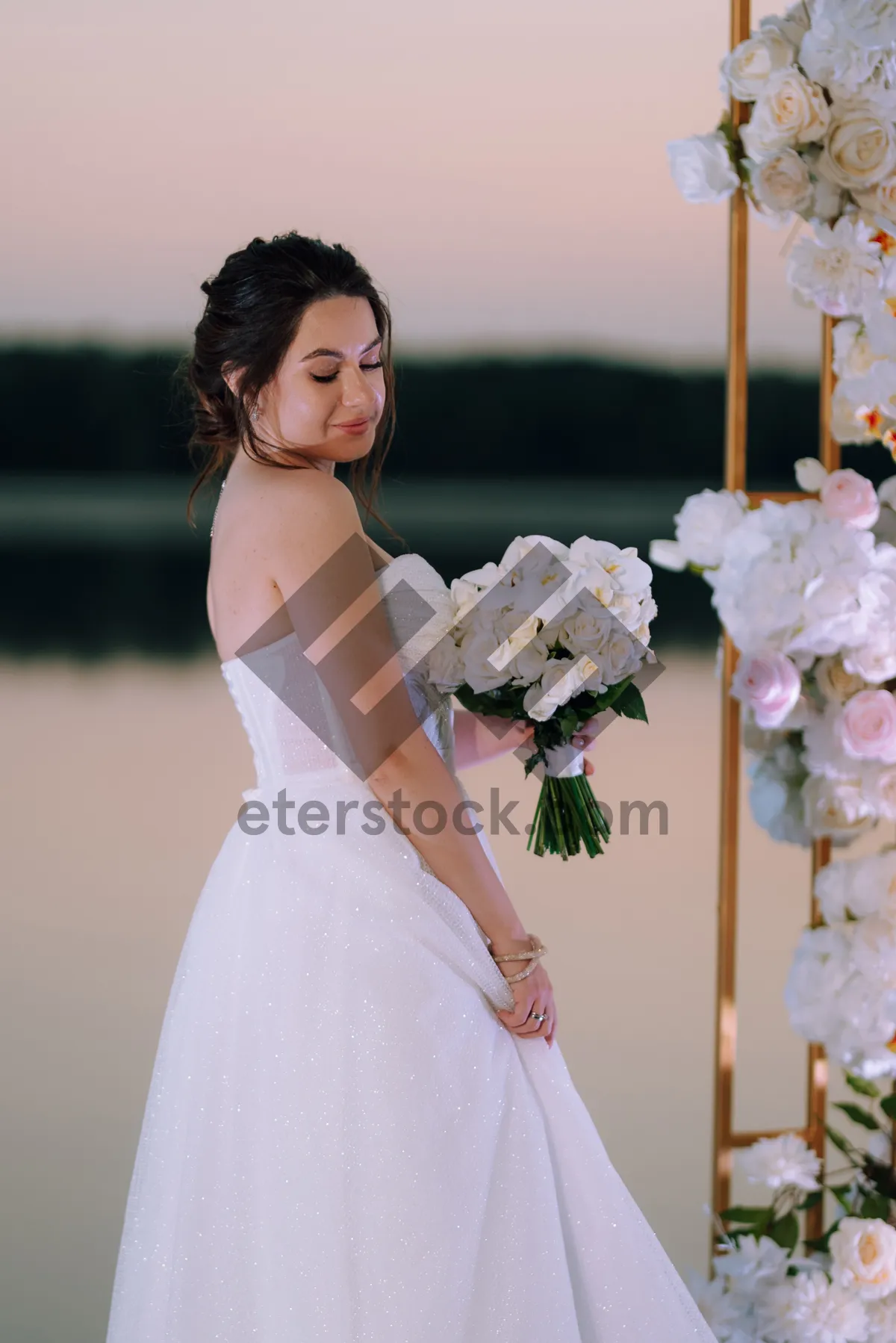 Picture of Happy bride and groom smiling on wedding day