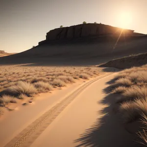 Serene Coastal Sunset Over Sandy Dunes