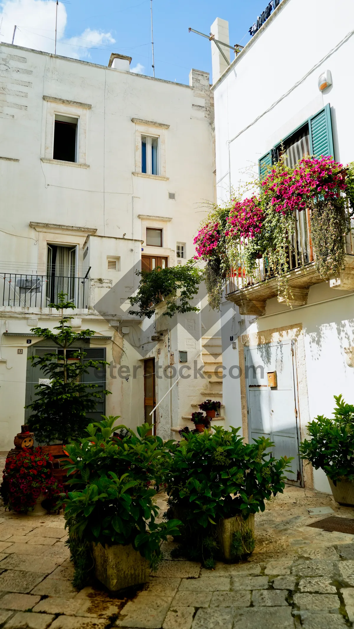 Picture of Old Residential Building with Picket Fence and Garden