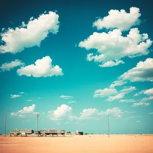 Vivid Summer Sky with Fluffy Clouds