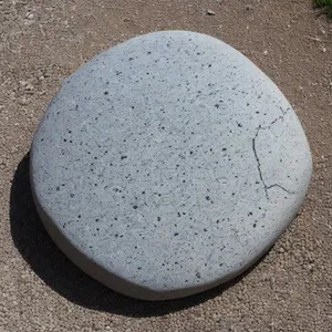 Gray Stone Texture with Grunge Pattern Covering Manhole