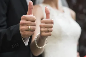 Hand gestures by male businessman for wedding proposal.