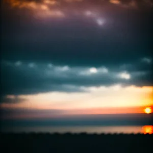 Dusk Sky with Vibrant Sunset Over Sea