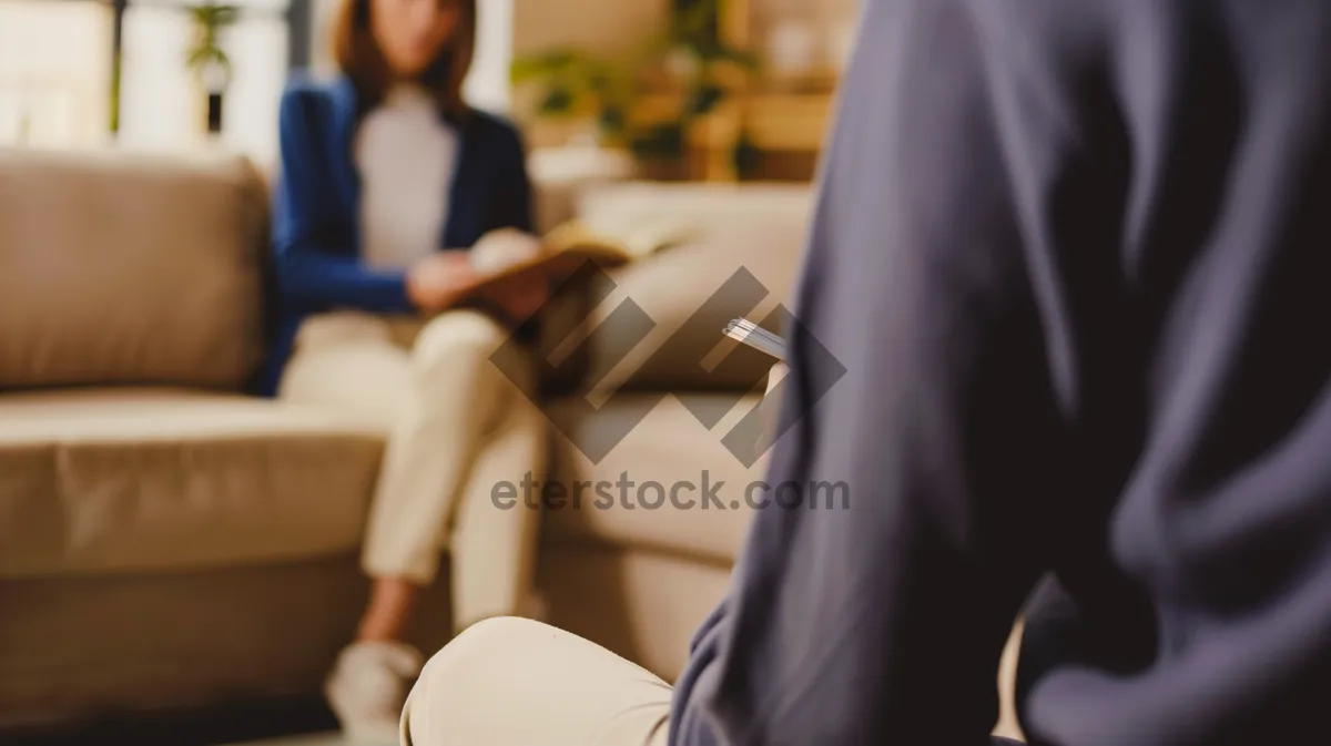 Picture of Happy Businessman Smiling in Corporate Office Setting