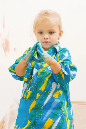 Happy Smiling Toddler Boy in Blue Bonnet Portrait.