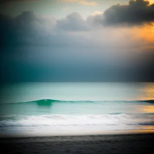 Serene Sunset Over Ocean's Golden Horizon