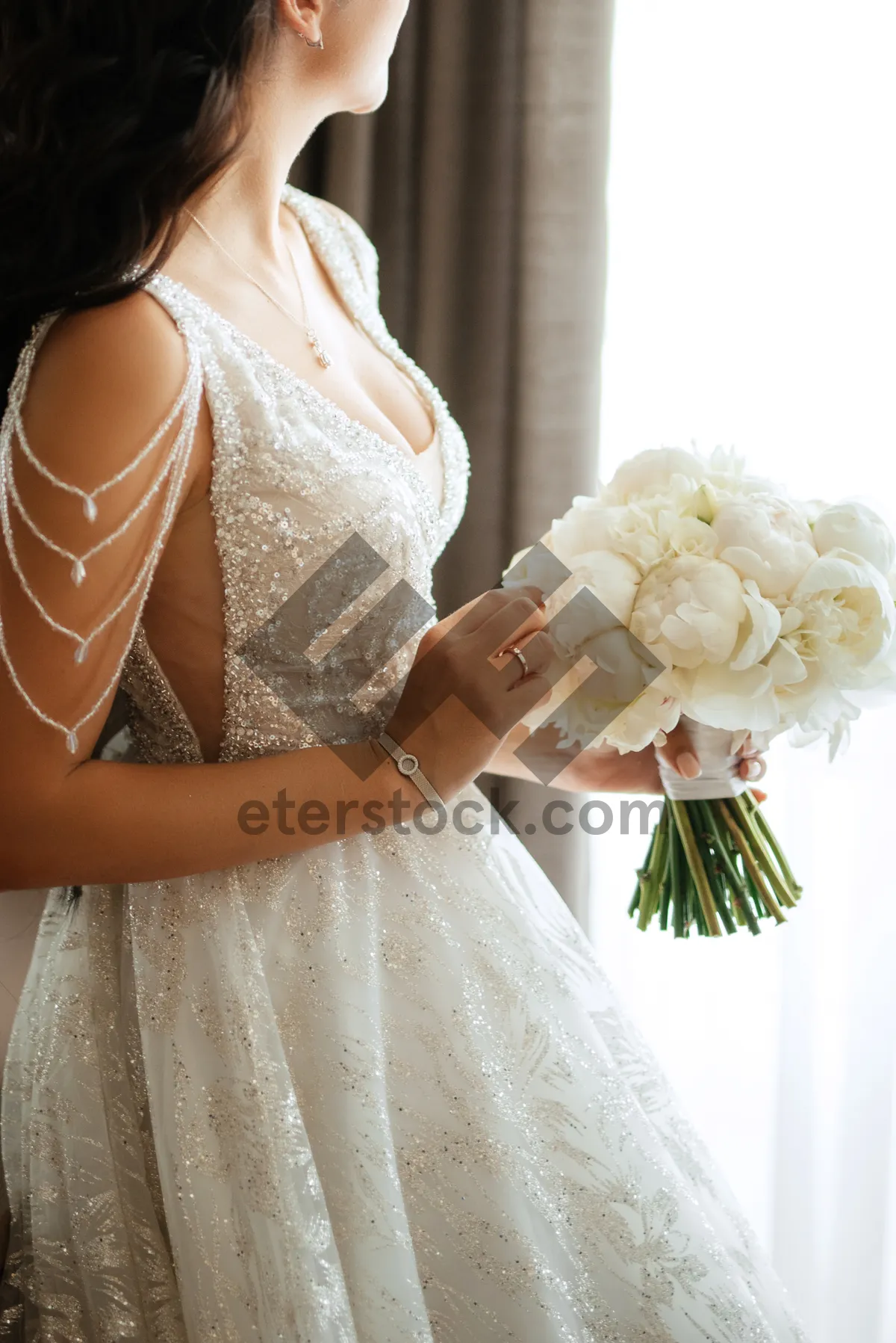 Picture of Happy bride in elegant wedding dress