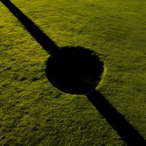 Competitive golfer on fairway during golf tournament