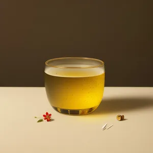 Yellow Herbal Tea in Transparent Glass Mug