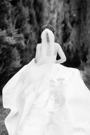 Happy Newlywed Couple Celebrating Wedding Outdoors