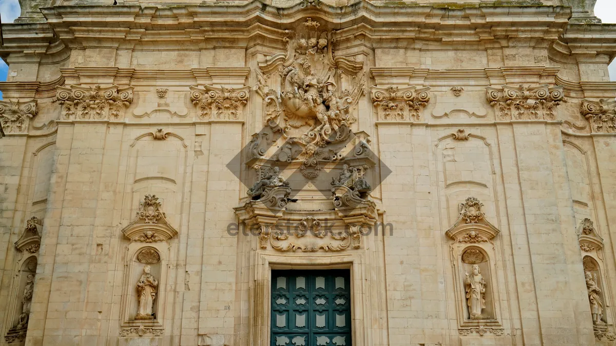 Picture of Historic Cathedral Facade with Ancient Columns and Stucco