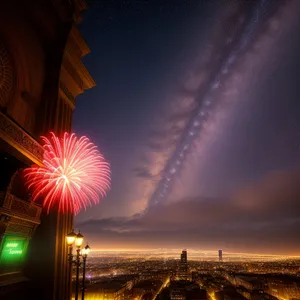 Festive Fireworks Illuminate Night Sky Above Ferris Wheel