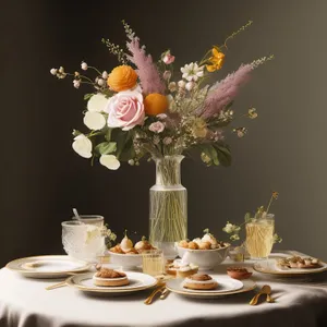 Luxurious dinner table setting with floral bouquet centerpiece