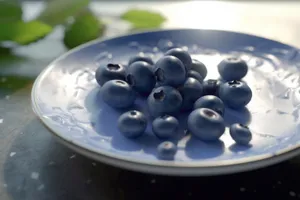 Round black billiard sphere on shiny table