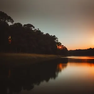 Tranquil Lake Sunset: Scenic Reflections in Nature