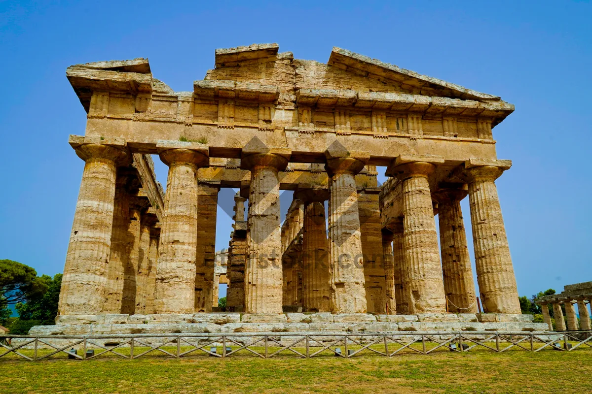 Picture of Ancient Roman Temple Columns in Historic City Skyline