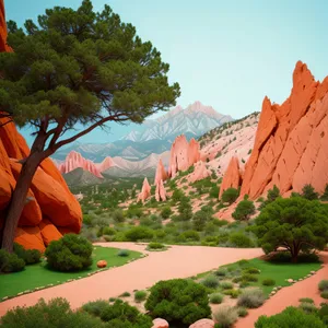 Scenic Mountain Landscape with Canyon and Orange Sky"
Note: The text can vary depending on the image and context.