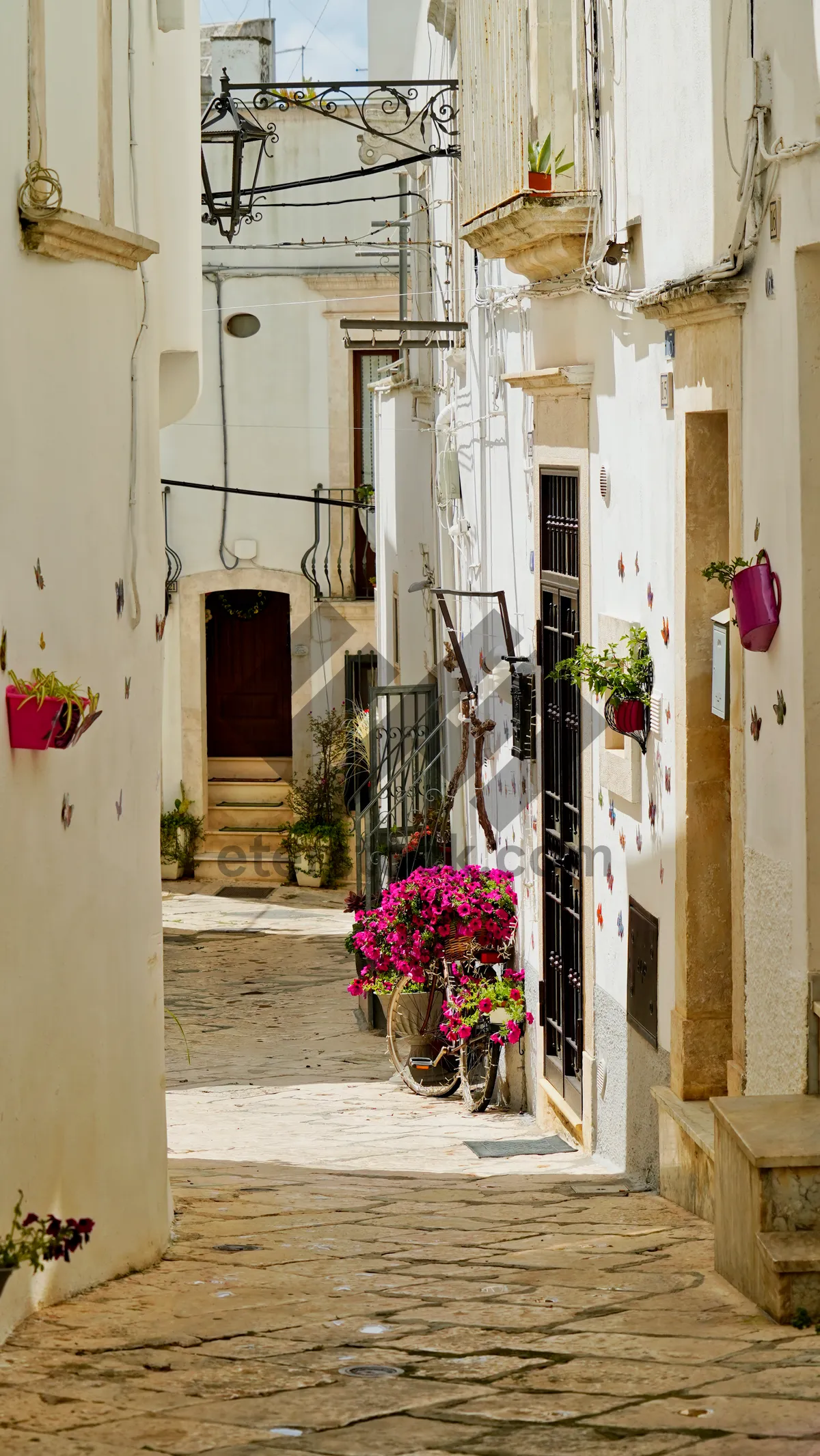 Picture of Ancient stone city house with wooden door and balcony