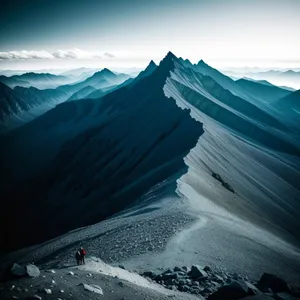 Snow-capped Alp-Range Majesty: Glacial Peaks Embracing Winter Wonderland.