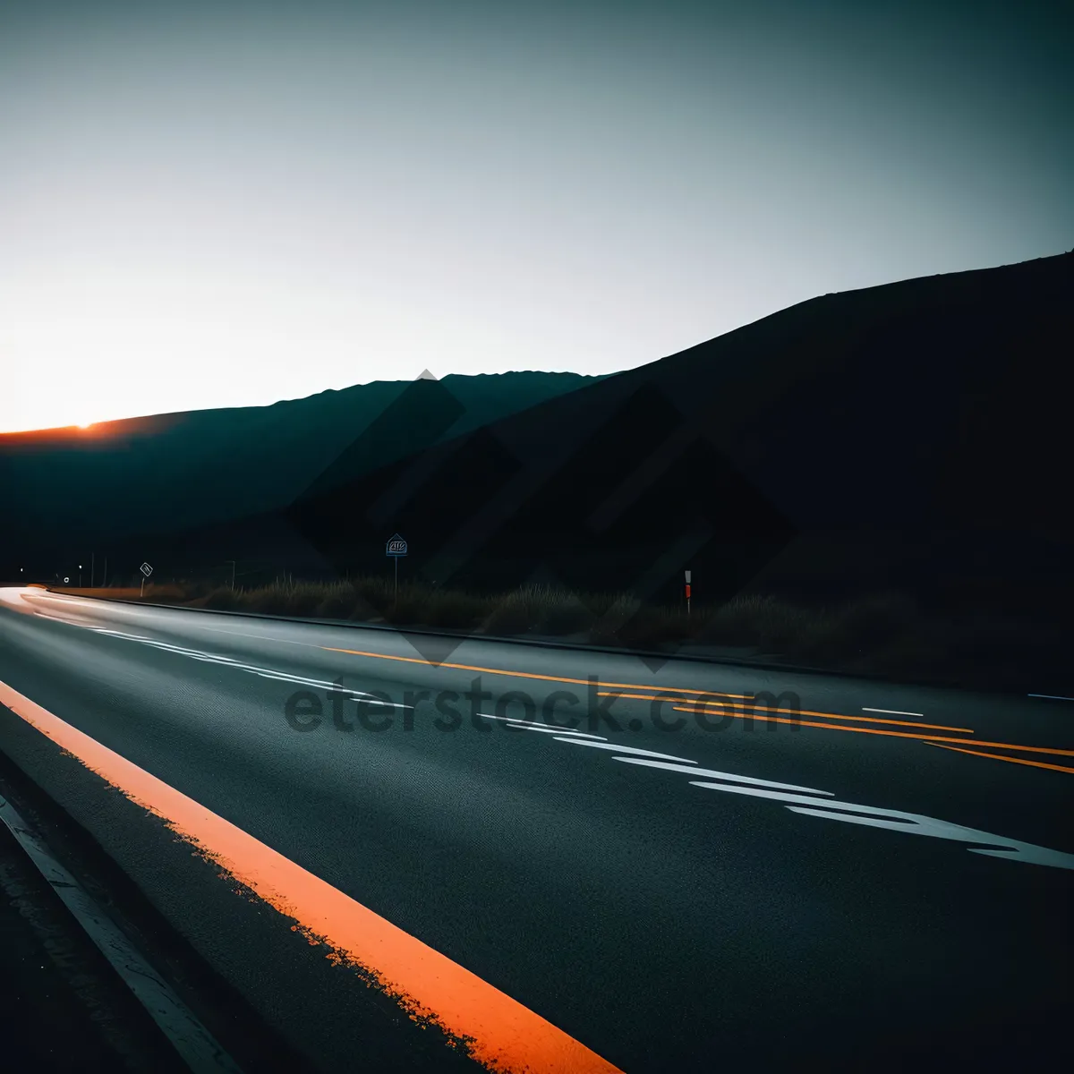 Picture of Serene Highway Drive Through Mountainous Landscape