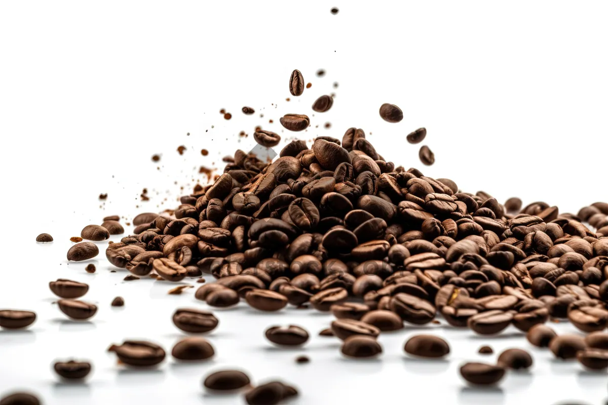 Picture of Dark espresso coffee beans close-up with texture.