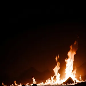 Fiery Inferno: Blazing Campfire's Glowing Heat